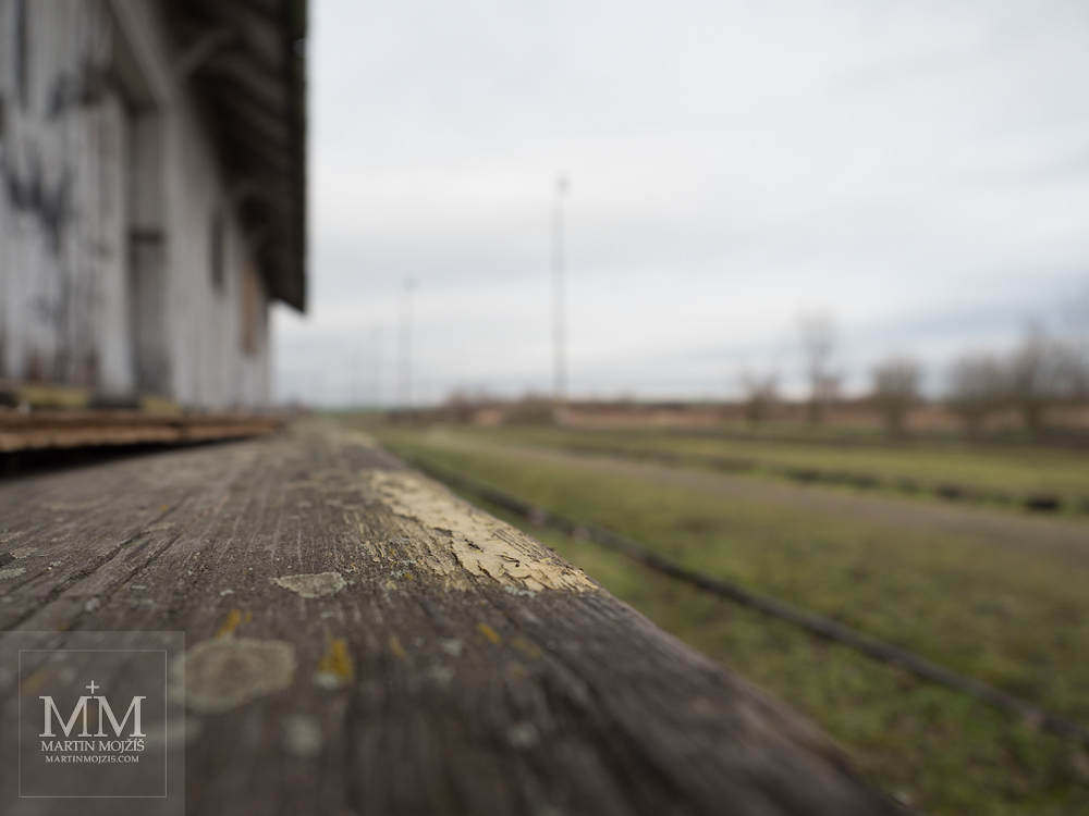Wooden loading ramp of a railway depot. Photograph created with Olympus 12 - 40 mm 2.8 Pro lens.